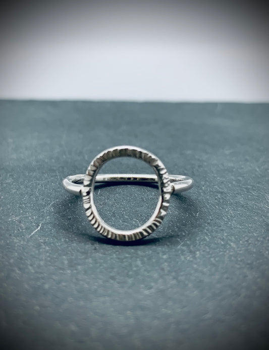 Open textured circle ring